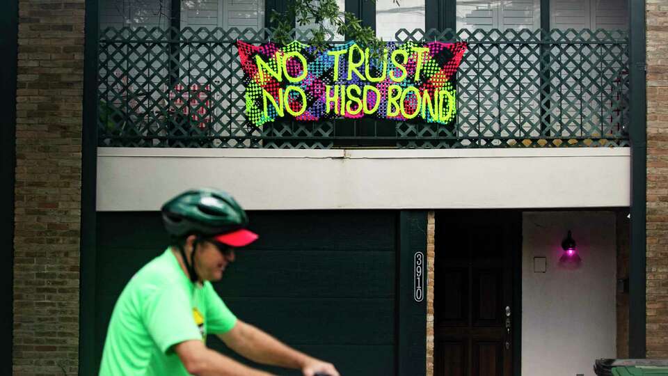 A “no trust, no HISD bond” sign posted outside a home, Friday, June 28, 2024 in Houston. Signs follow the district’s proposition of a $4.4 billion bond on ballots in November to address campus infrastructure needs.