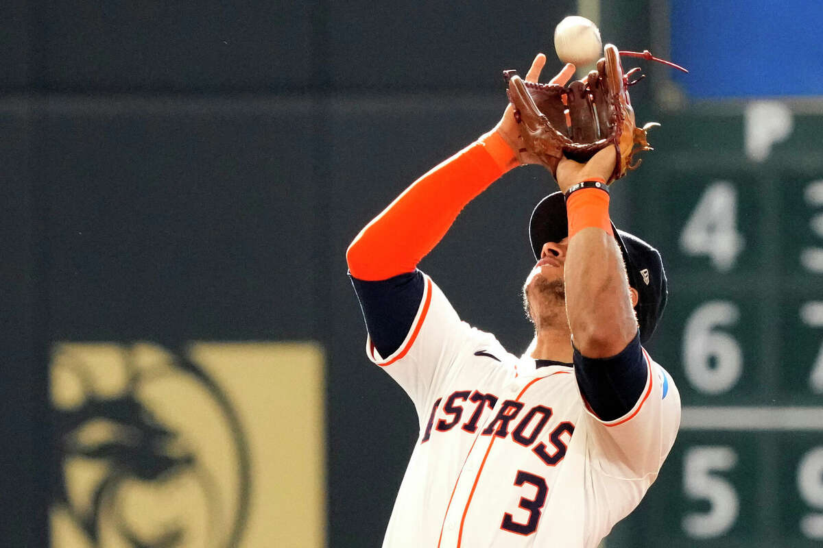 Houston Astros shortstop Jeremy Peña (3) catches Detroit Tigers left fielder Akil Baddo's pop out during the ninth inning of an MLB baseball game at Minute Maid Park on Saturday, June 15, 2024, in Houston.