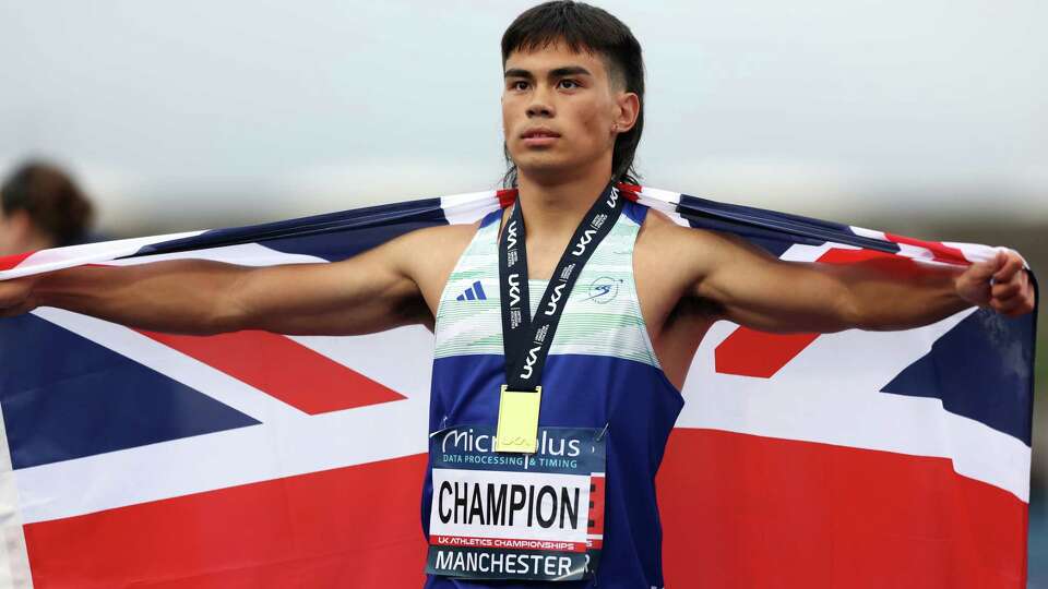 MANCHESTER, ENGLAND - JUNE 29: Gold medalist Louie Hinchliffe of Team City of Sheffield & Dearne AC poses for a photo during the medal ceremony for Men's 100 Metres Final on Day One of UK Athletics Championships 2024 at Manchester Regional Arena on June 29, 2024 in Manchester, England.