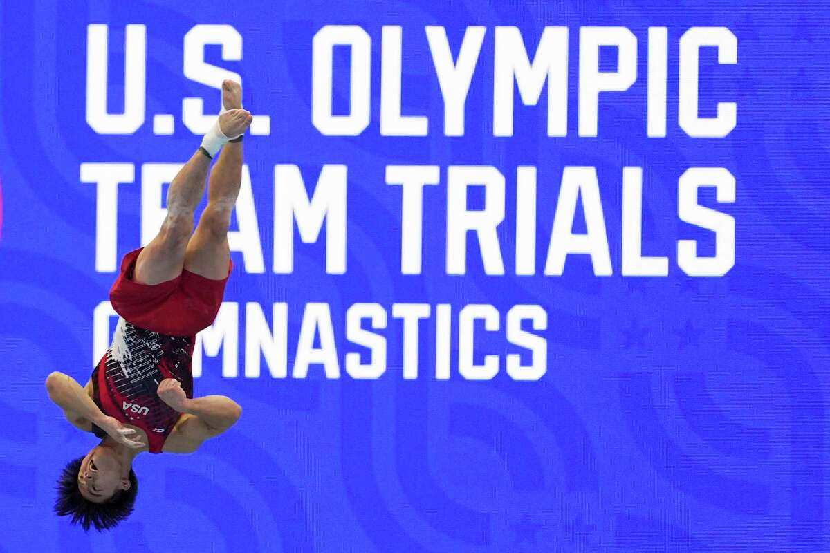 Asher Hong competes in the floor exercise at the United States Gymnastics Olympic Trials on Saturday, June 29, 2024, in Minneapolis. (AP Photo/Abbie Parr)