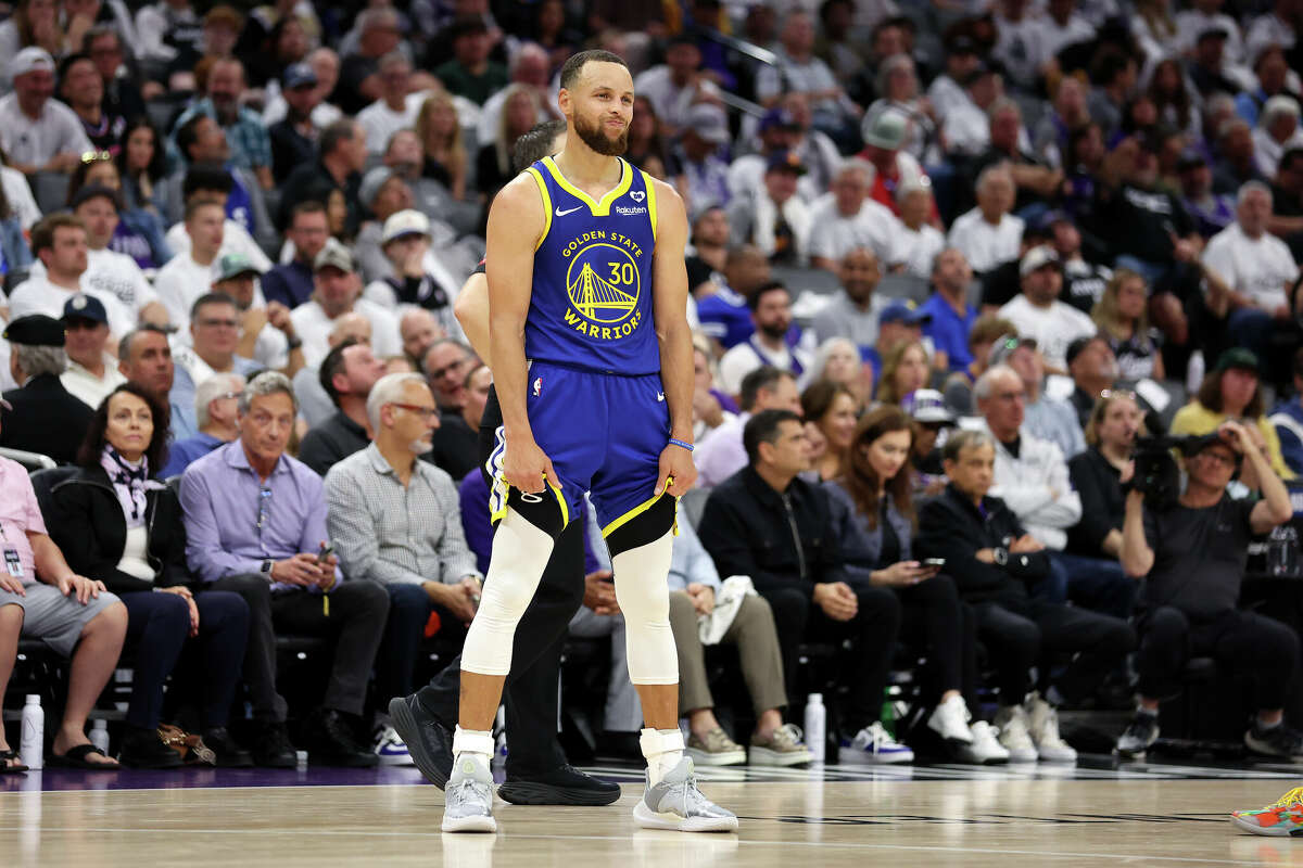 Stephen Curry #30 of the Golden State Warriors stands on the court during the end of the the second half of their loss to the Sacramento Kings during the Play-In Tournament at Golden 1 Center on April 16, 2024 in Sacramento, Calif.