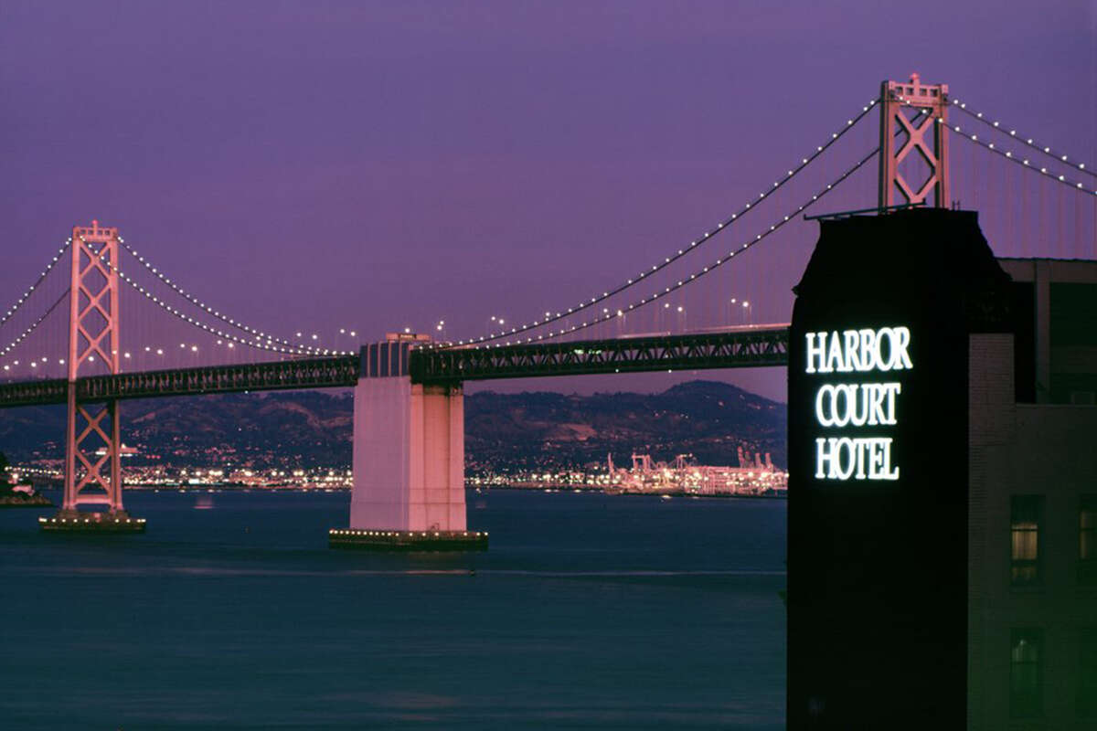 A view of the Harbor Court Hotel with the Bay Bridge in the background. 