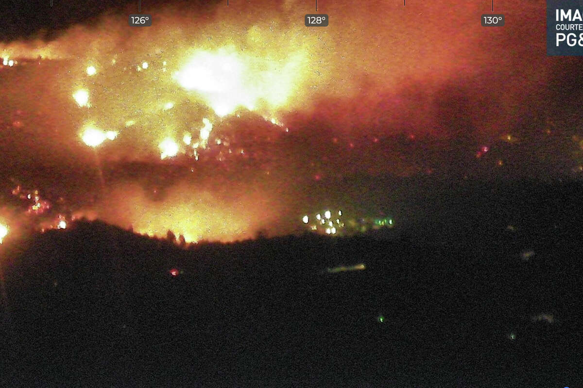 A still image of the French Fire, as captured by a wildfire camera at Mt. Bullion, as it was seen at 10:29 p.m. on Thursday, July 4, 2024.