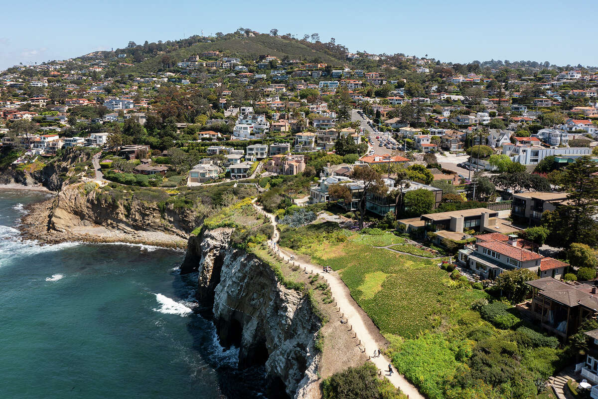 In an aerial view, luxury homes line the coast of La Jolla on April 27, 2024 in San Diego, California.