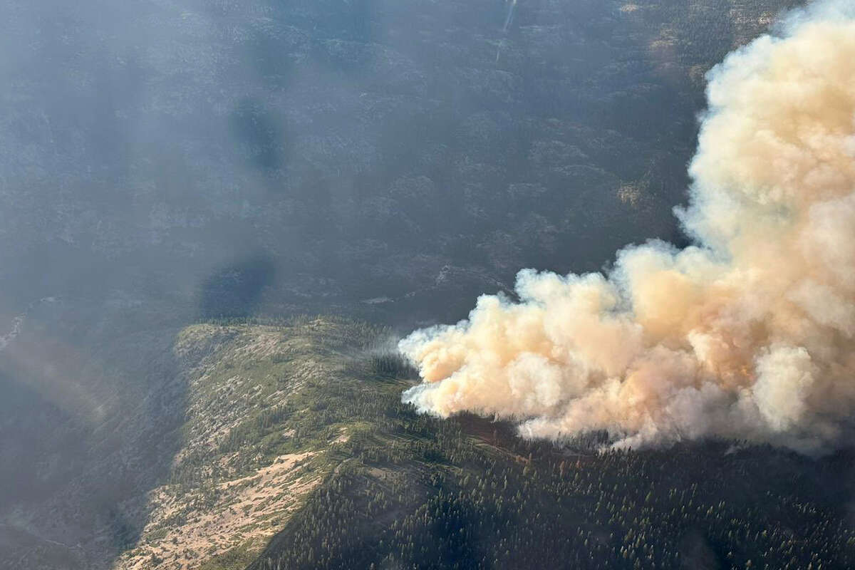 A plume of smoke appeared in the sky above Truckee shortly after the Royal Fire broke out on Sunday evening.