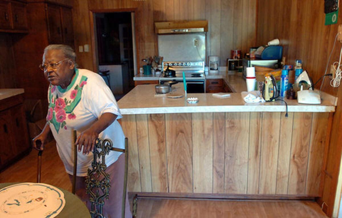 79-year-old Johnnie Mae Guilbeaux's Chalton-Pollard neighborhood home in Beaumont is finally going to be torn down and rebuilt after suffering extensive damage from Hurricane Rita in 2005. Pete Churton/The Enterprise