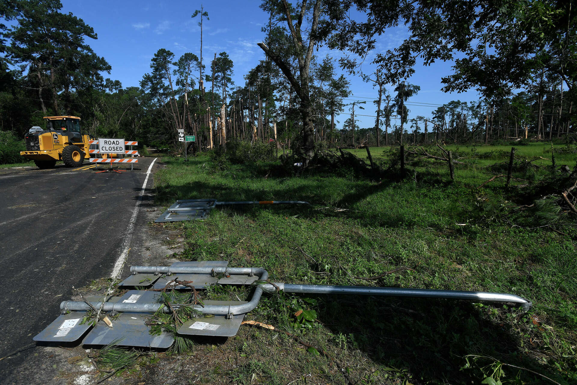 Jasper residents and utility crews are cleaning up tornado damage