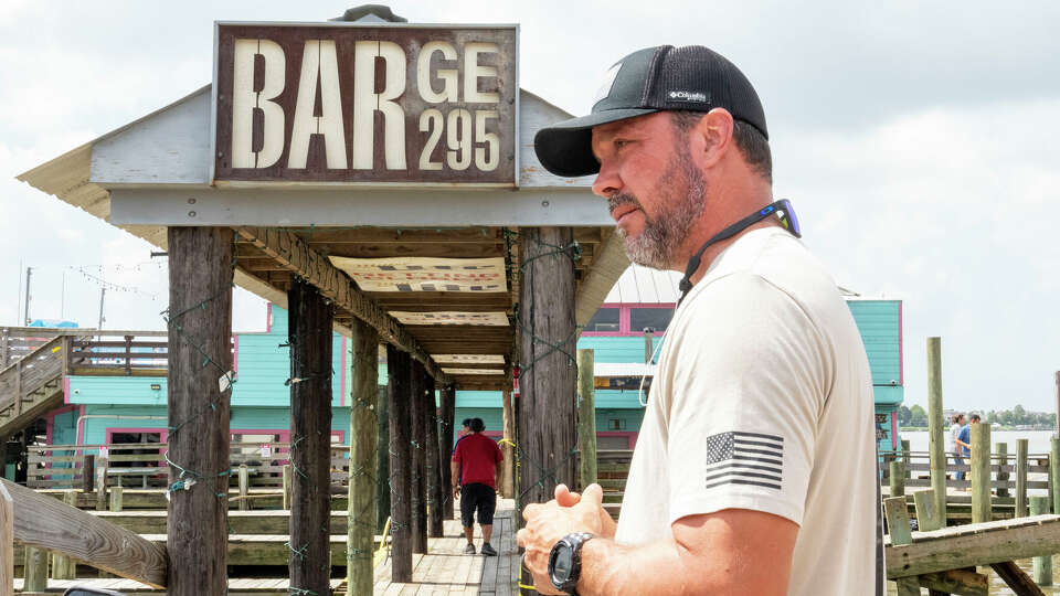 Barge 295 owner Mike Robinson discusses the history and future of the historic eatery and bar on Clear Lake Tuesday, July 9, 2024 after the barge the establishment sits on sank as Hurricane Beryl passed through the area bringing high waves and strong winds Monday.