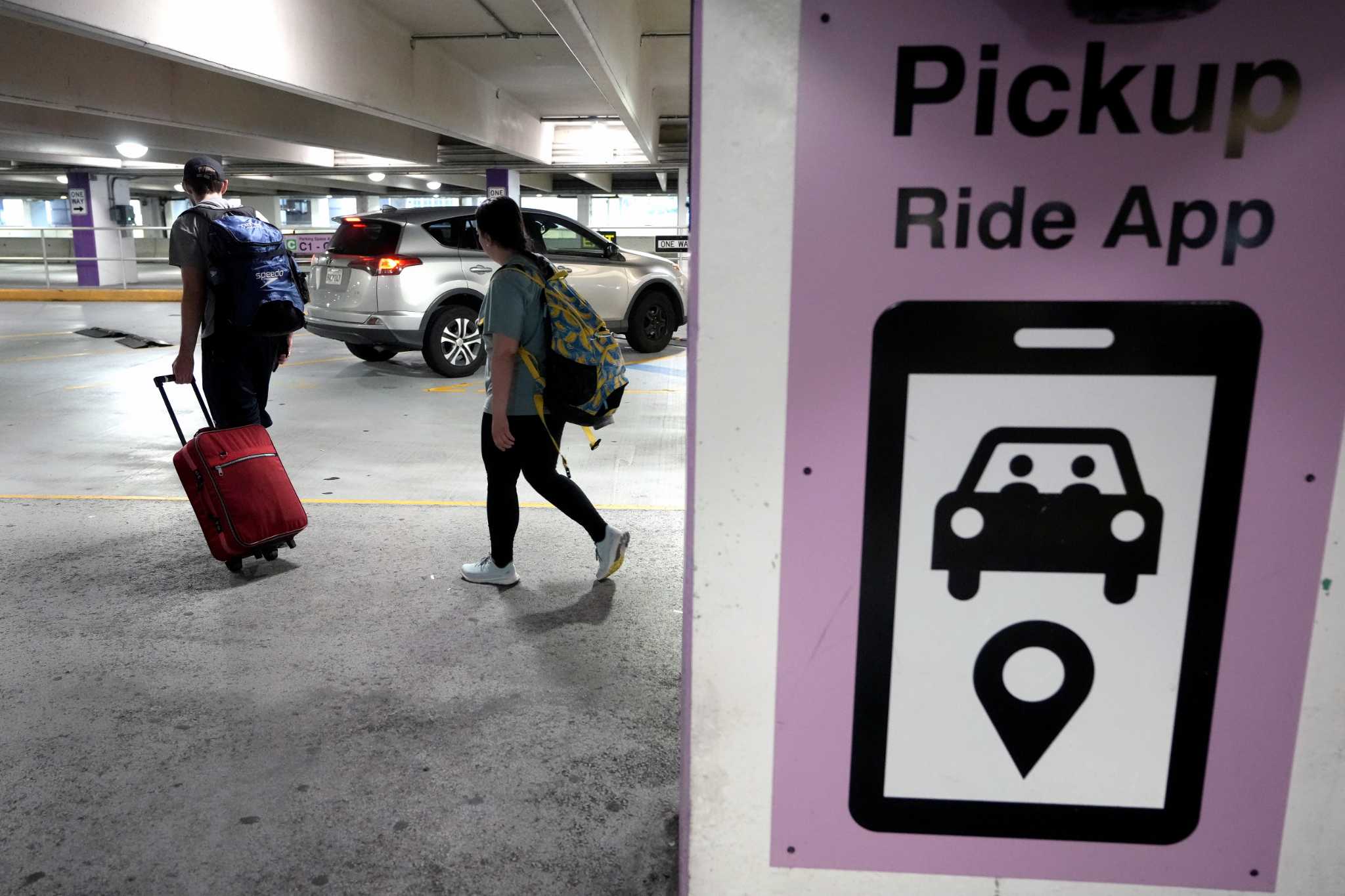 Vote in Massachusetts would give Uber and Lyft drivers the right to form a union
