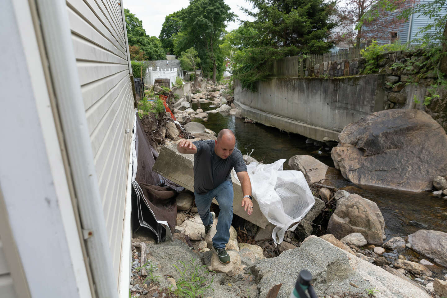 Highland Falls residents still struggling one year after floods