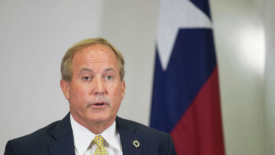 Texas Attorney General Ken Paxton discusses a proposed $26 billion multi-state opioid settlement during a news conference at the Houston Recovery Center Thursday, Aug. 5, 2021 in Houston. Paxton encouraged cities and counties to sign on to the settlement agreement that could yield up to $1.5 billion for the state.