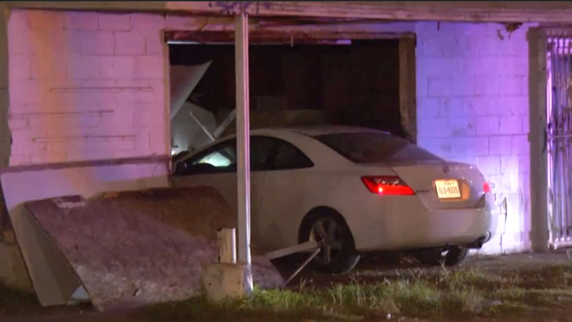 San Antonio woman crashes car into Westside structure, arrested