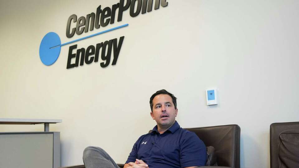 CenterPoint Energy CEO Jason Wells speaks to a reporter about the effort to restore power in the aftermath of Hurricane Beryl on Thursday, July 11, 2024, at a CenterPoint Energy office in Houston.