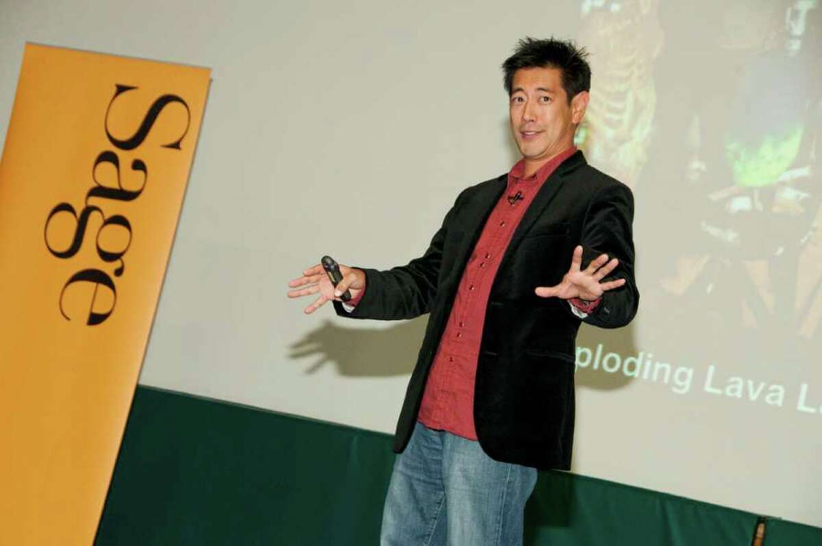 Grant Imahara, the brainy electronics engineer, robot builder and camera-shy co-host of the Discovery Channel show "MythBusters," entertains fans Thursday night at Sage College of Albany. (Tamara Hansen / Sage Colleges)