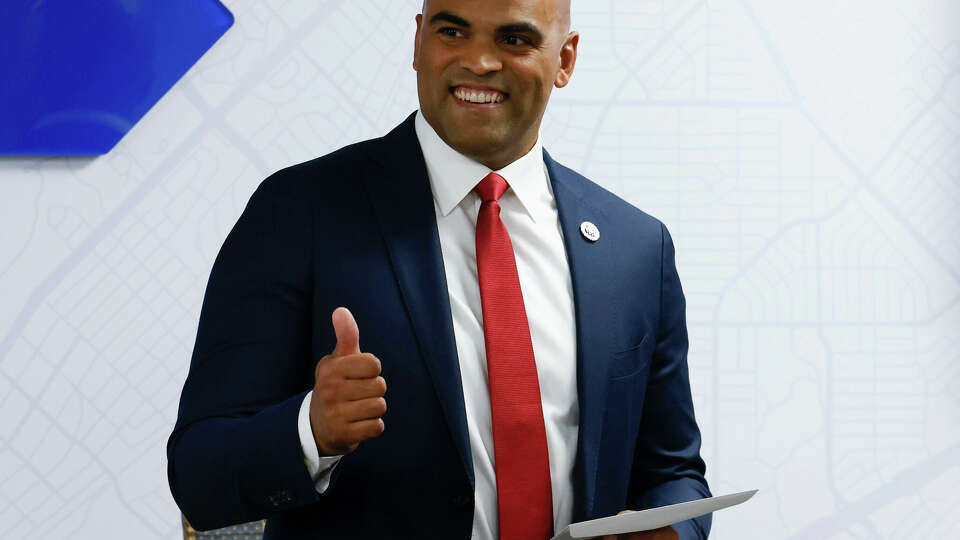 U.S. Rep. Colin Allred, D-Texas, gestures toward the crowd during an award presentation at the North Dallas Chamber on Oct. 4, 2022, in Dallas. (Shafkat Anowar/The Dallas Morning News/TNS)