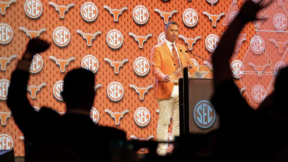 Texas head football coach Steve Sarkisian takes questions from reporters during the Southeastern Conference NCAA college football media days Wednesday, July 17, 2024, in Dallas. (AP Photo/Jeffrey McWhorter)