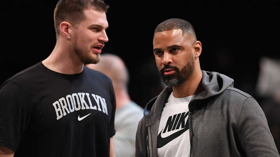 NEW YORK, NEW YORK - DECEMBER 15: Tiago Splitter of the Brooklyn Nets and Ime Udoka before the game against the Philadelphia 76ers at Barclays Center on December 15, 2019 in New York City. NOTE TO USER: User expressly acknowledges and agrees that, by downloading and or using this photograph, User is consenting to the terms and conditions of the Getty Images License Agreement. (Photo by Matteo Marchi/Getty Images)