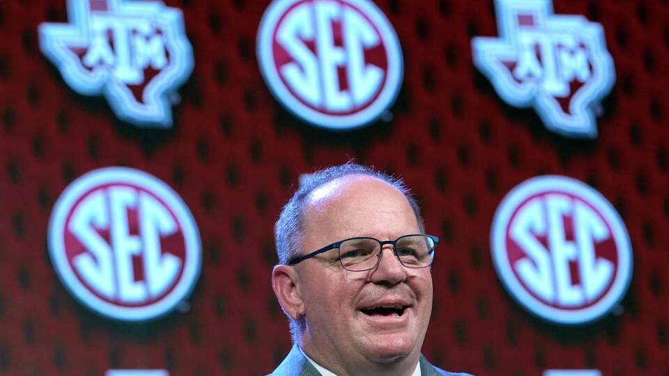 Texas A&M head coach Mike Elko speaks during Southeastern Conference NCAA college football media days, Thursday, July 18, 2024, in Dallas. (AP Photo/LM Otero)