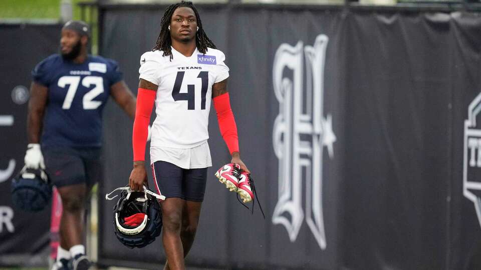 Houston Texans safety Calen Bullock (41) walks onto the practice field during an NFL training camp Thursday, July 18, 2024, in Houston.