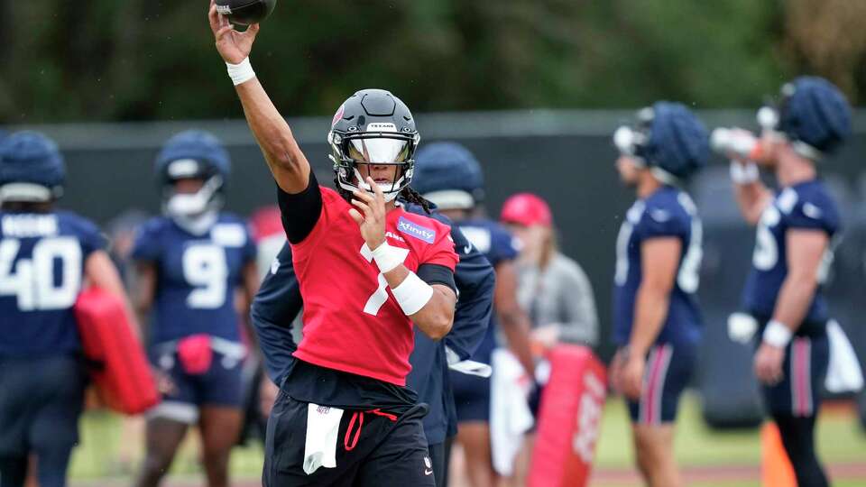 Houston Texans quarterback C.J. Stroud throws a pass during an NFL training camp Thursday, July 18, 2024, in Houston.