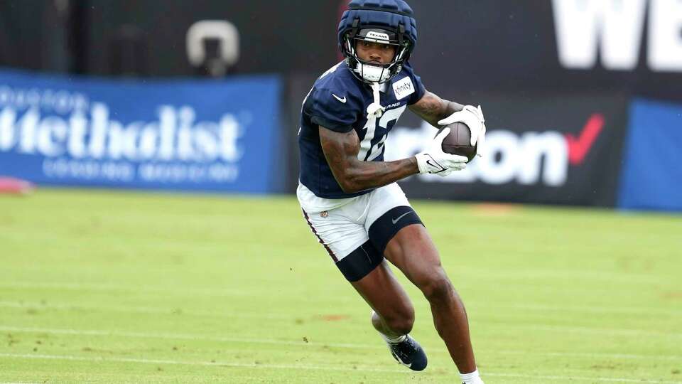 Houston Texans wide receiver Nico Collins runs upfield after a catch during an NFL training camp Thursday, July 18, 2024, in Houston.