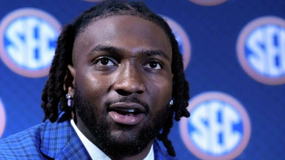 Texas A&M lineman Shemar Turner speaks to reporters during the Southeastern Conference NCAA college football media days Thursday, July 18, 2024, in Dallas. (AP Photo/LM Otero)