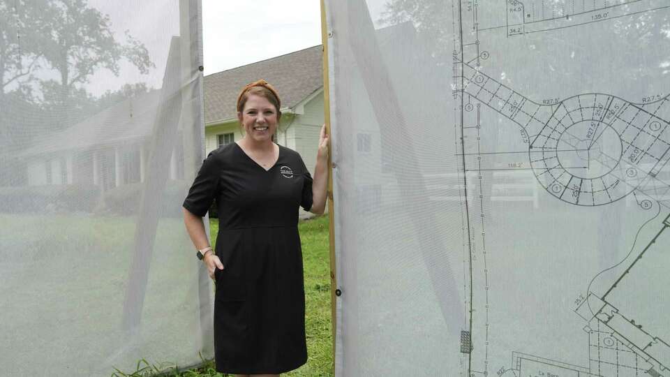 Angela Kovar, owner of Blue Magnolia, a 10-acre property that once was an equestrian farm, is photographed on the property ahead of its 2025 expected open on Thursday, July 18, 2024 in The Woodlands.