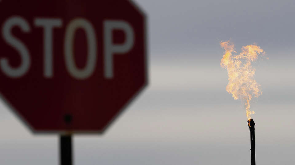 A flare burns near Vanessa and Victor Hinojos’ home on Wednesday, March 6, 2024 in Odessa.