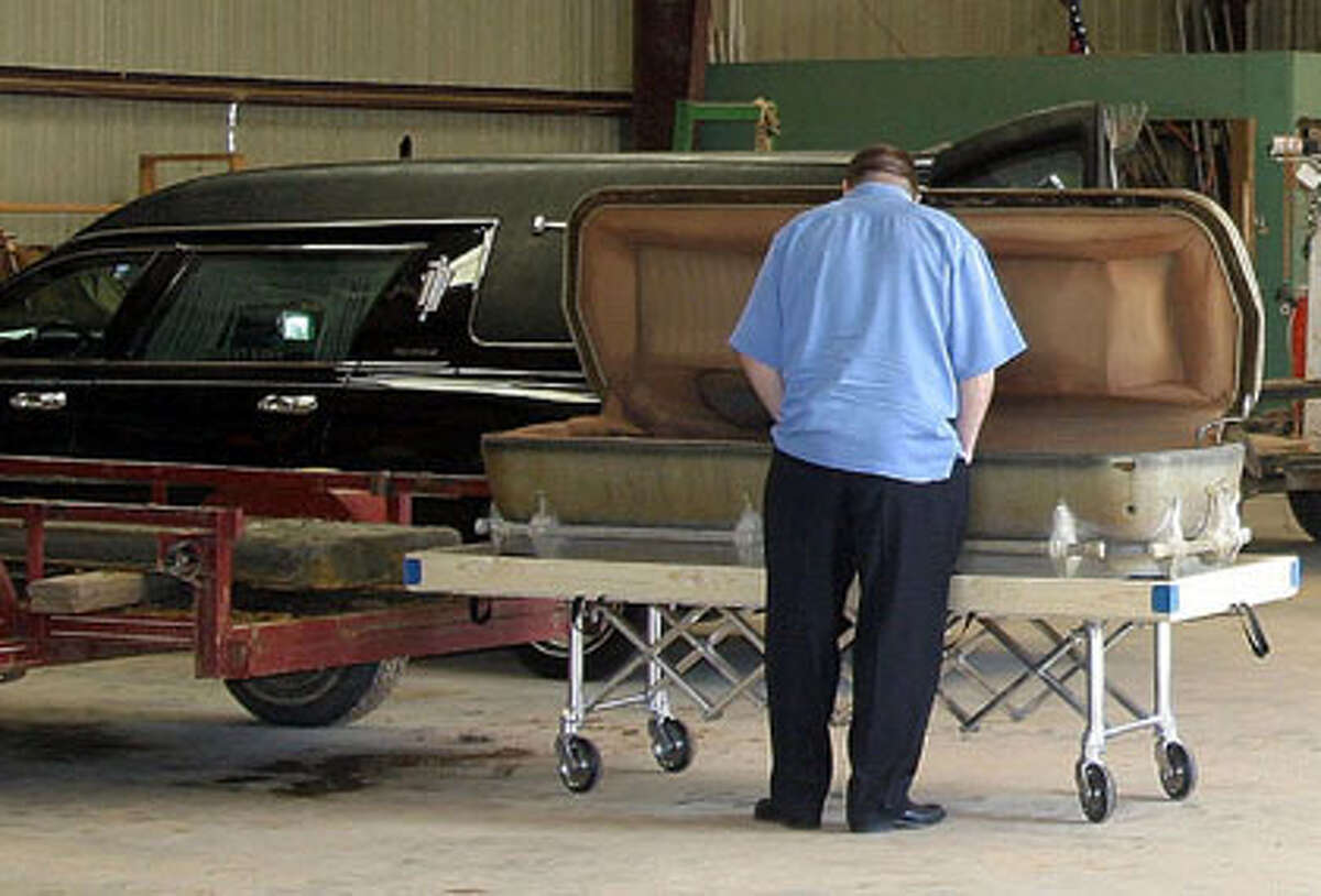 Jay Richardson, born three months after his famous father died in an Iowa plane crash, saw him for the first time when the Big Bopper's casket was exhumed in on March 6, 2007, 48 years after "the day the music died." Photo by Ron Franscell/The Enterprise