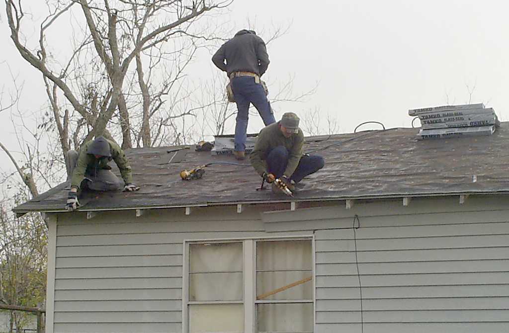 Mennonites travel thousands of miles to roof