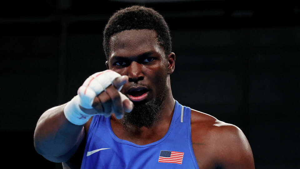 The United States' Joshua Edwards celebrates after defeating Cuba's Fernando Arzola in the super heavyweight division of the 2023 Pan Am Games on October 26, 2023 in Santiago, Chile.