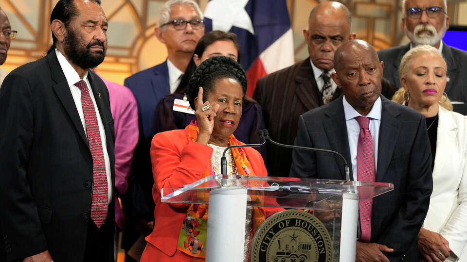 Congresswoman Sheila Jackson Lee with Congressman Al Green and Houston Mayor Sylvester Turner speaks during a press conference to discuss Houston ISD's plans to convert libraries at most NES and NES-aligned campuses to team centers at City Hall on Monday, July 31, 2023 in Houston.