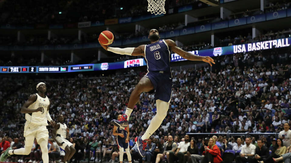 LeBron James of USA scores a basket during the 2024 USA Basketball Showcase match between USA and South Sudan at The O2 Arena on July 20, 2024 in London, England. (Photo by Henry Browne/Getty Images)