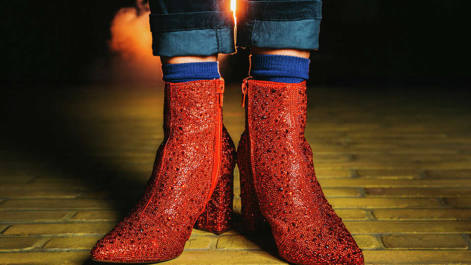 Sarah Sachi as Dorothy in 'The Wizard of Oz' onstage at Queensbury Theatre in Houston