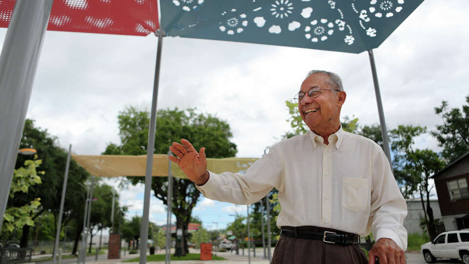 Felix Fraga, a former City Council member and longtime Second Ward community leader, waves at a friend while standing on the Navigation Esplanade on June 3, 2014, in Houston. Fraga died at 94 on Monday, June 22, 2024.