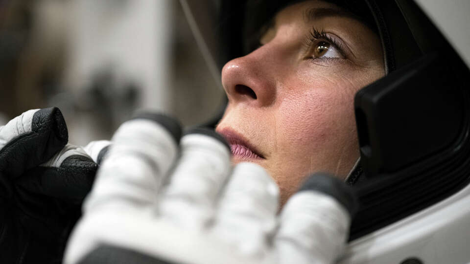 Anna Menon wears her spacesuit during acceptance testing ahead of the Polaris Dawn mission launch this summer.