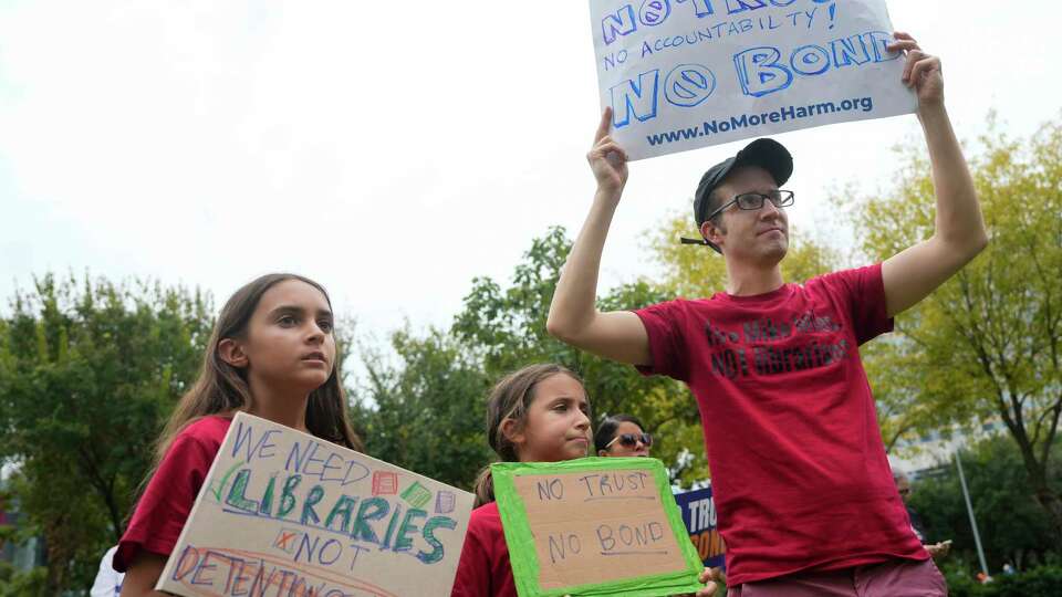 A Houston ISD family participate the American Federation of Teacher’s rally against state takeovers of public school Wednesday, July 24, 2024 at Discovery Green in Houston.