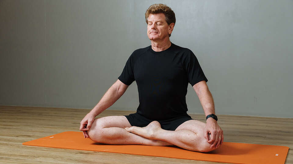 Doug Keller, yoga expert, will lead a weekend retreat in Galveston at a tourist destination to provide participants with a combination of poses and breathing exercises. 