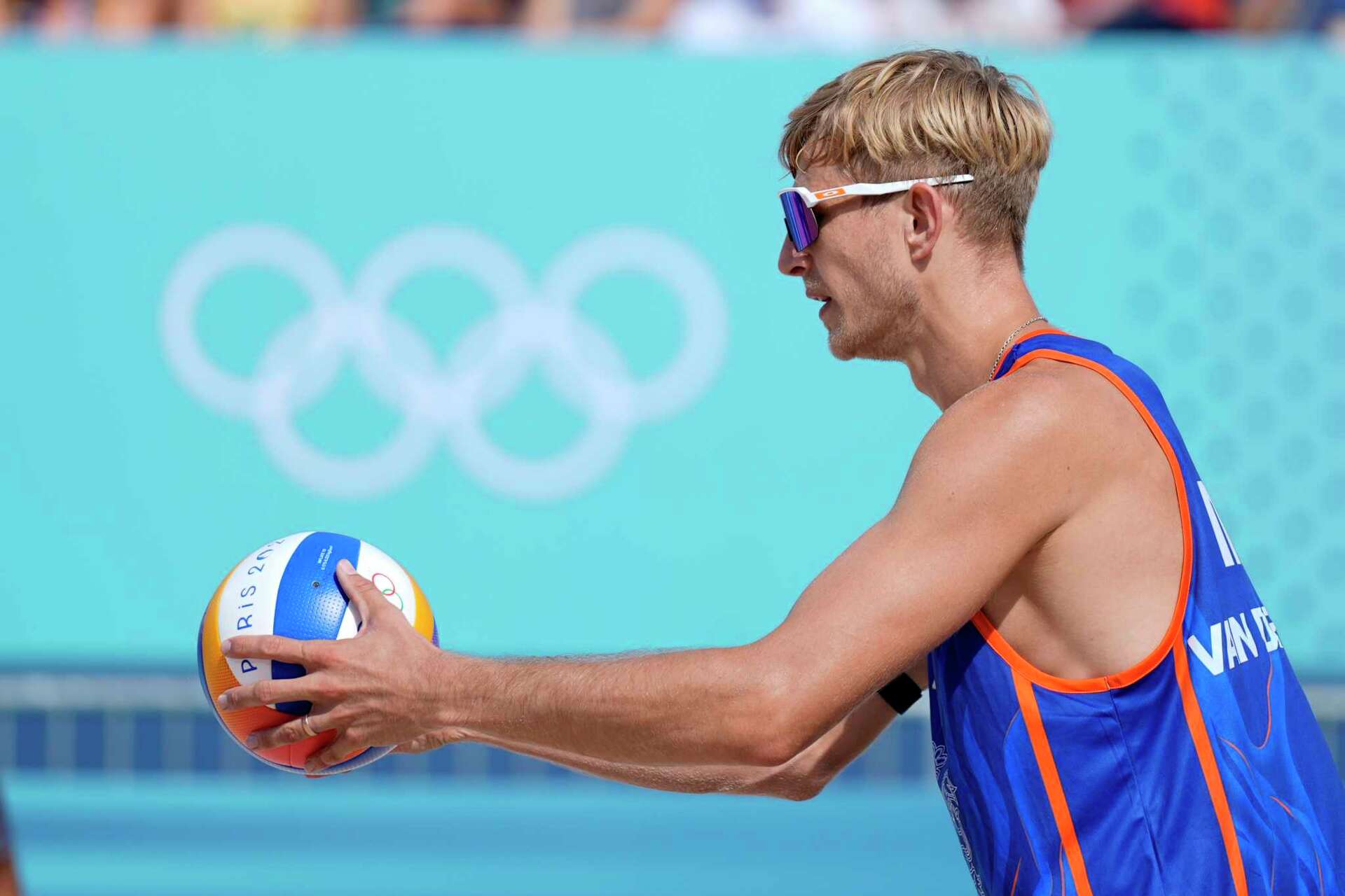 Dutch beach volleyball player who was convicted of rape is booed before  losing first Olympic match