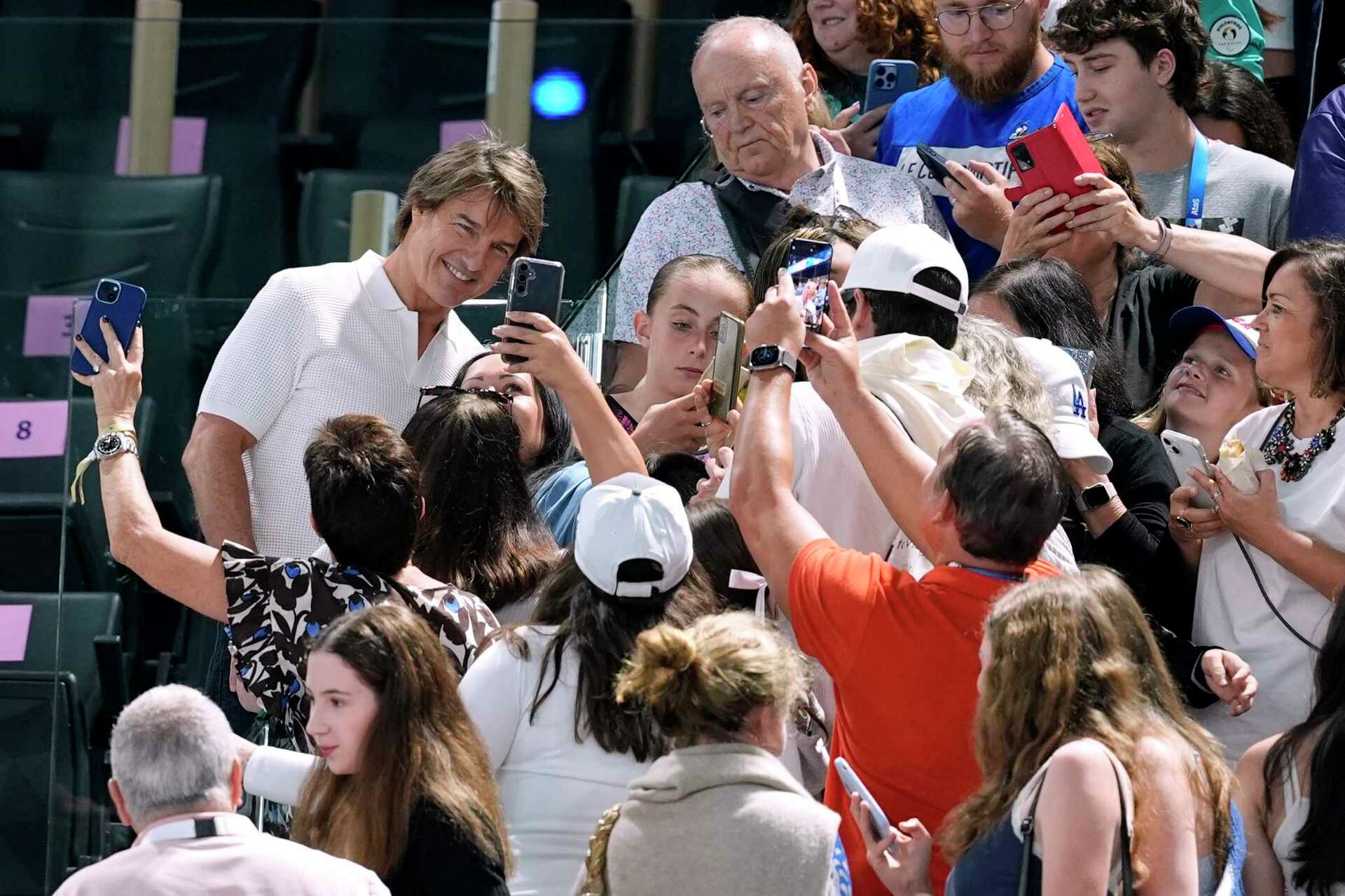 When Biles competes, the show is in the stands too. Tom Cruise, more stars  attend her Olympic return