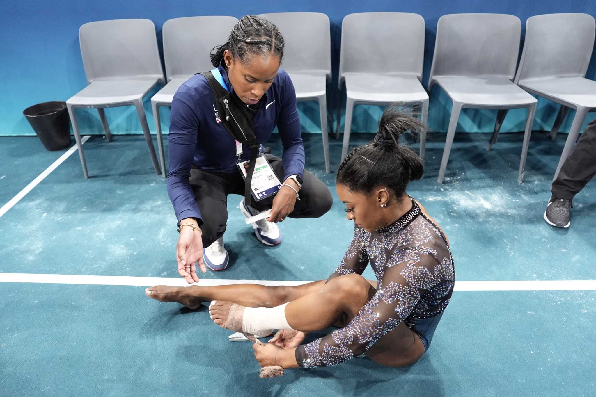 Simone Biles shakes off a calf injury to dominate during Olympic