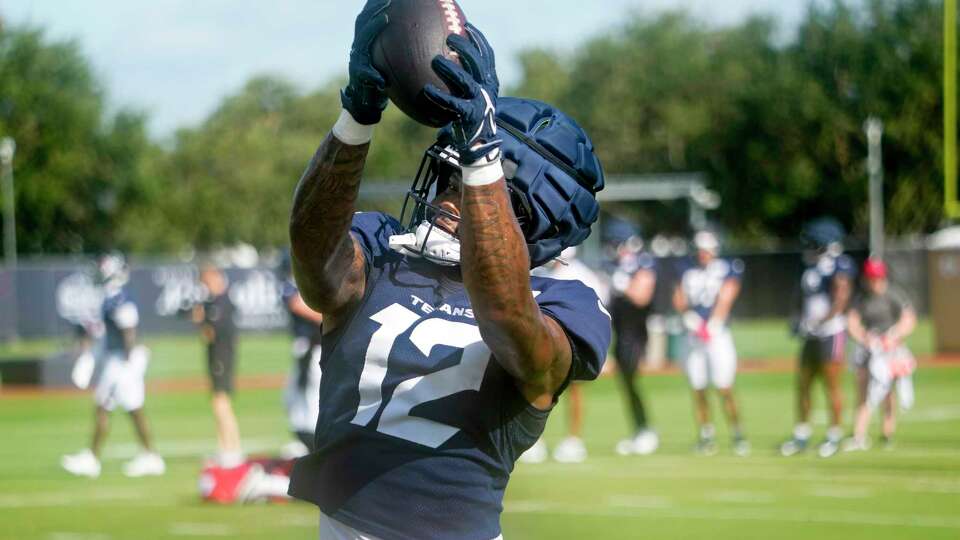 Houston Texans wide receiver Nico Collins makes a catch during an NFL training camp Monday, July 29, 2024, in Houston.