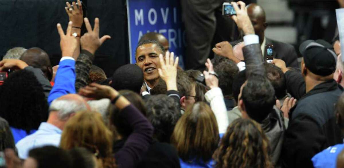 President Obama greets people in the crowd after speaking at the Arena at Harbor Yard in downtown Bridgeport, Conn. on Saturday October 30, 2010.