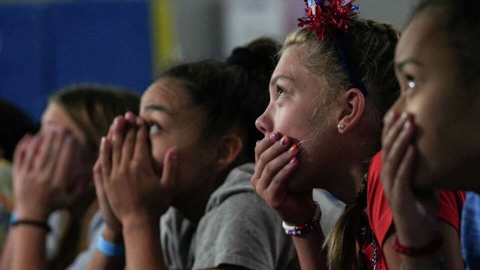 Scotlyn Callihan, 13, reacts as she watches the women's artistic gymnastics team finals of the 2024 Summer Olympics during a watch party Tuesday, July 30, 2024, at World Champions Centre in Spring.