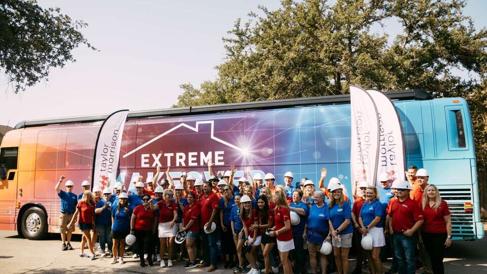 Taylor Morrison team members celebrate building a house for the pilot episode of ABC's Extreme Makeover: Home Edition in Hutto in September of 2023.