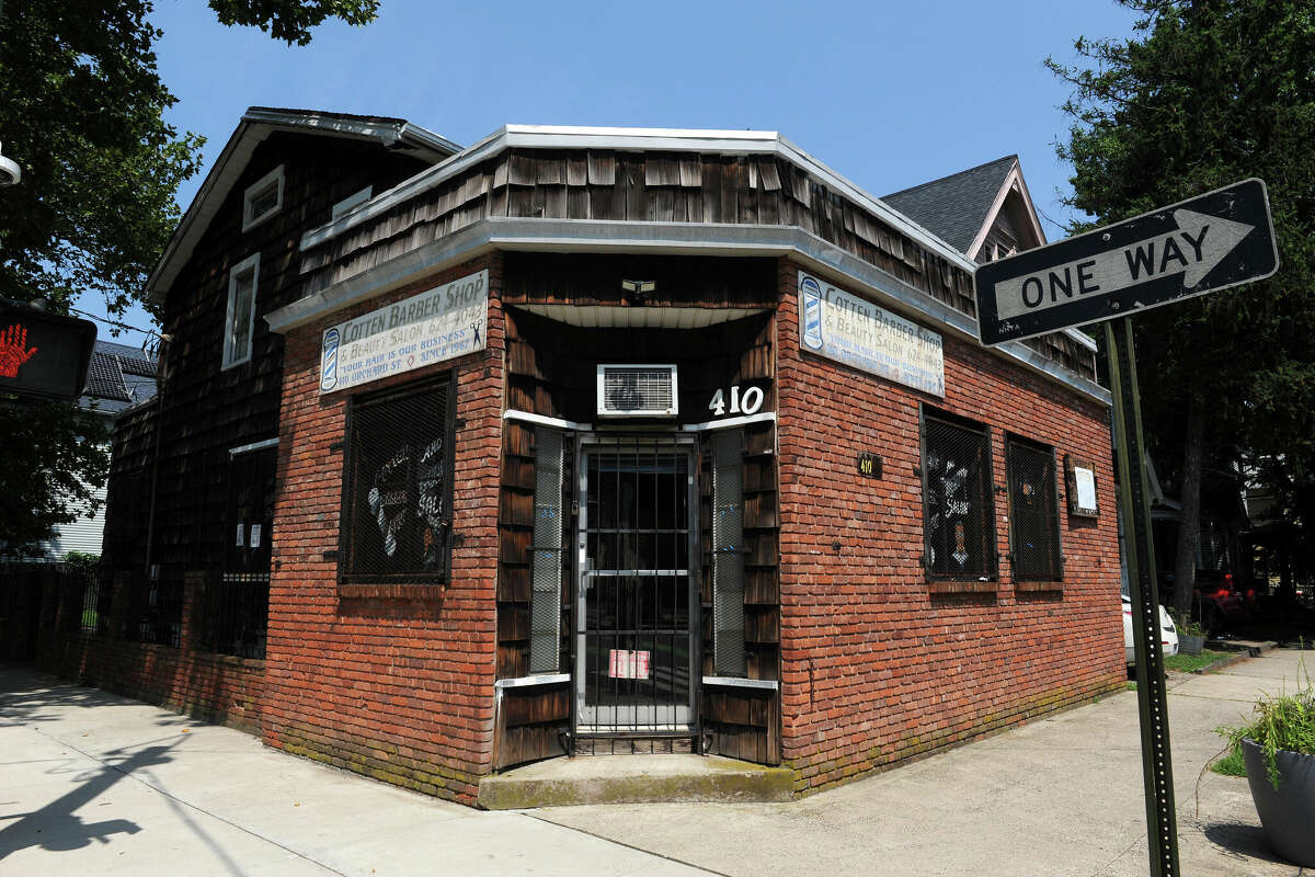 The former Cotten Barber Shop & Beauty Salon and adjoining home at the. corner of Orchard Street and Edgewood Avenue in New Haven photographed on August 1, 2024 is slated for affordable housing.