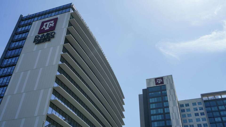 Texas A&M University buildings EnMed Tower and Life Tower are photographed on Thursday, Aug. 1, 2024 in Houston.