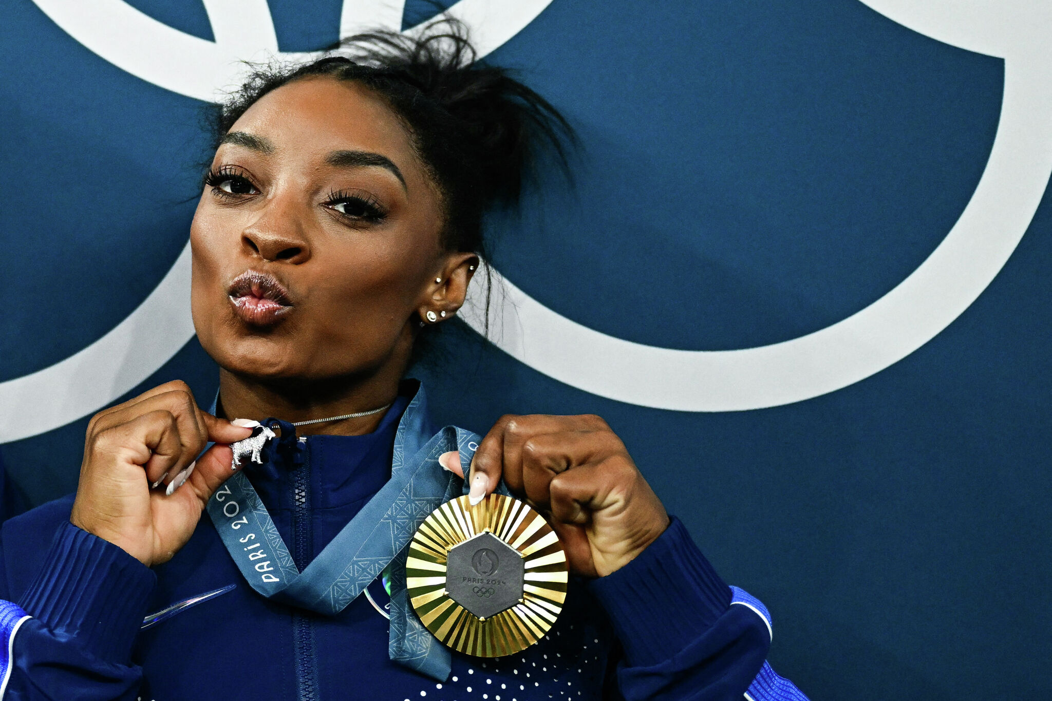 Simone Biles' GOAT necklace Olympian makes joke about her haters