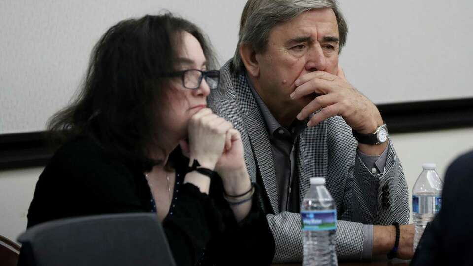 Rose Marie Kosmetatos, left, and her husband, Antonios Pagourtzis, parents of accused Santa Fe High School shooter Dimitrios Pagourtzis, await the start of the third day of the civil trial against them in Galveston County Court No. 3 Judge Jack EwingÕs courtroom at the Galveston County Courthouse in Galveston, Texas on Friday, Aug. 2, 2024. The civil lawsuit was filed by families of seven of those killed and four of the 13 people wounded in the 2018 shooting.