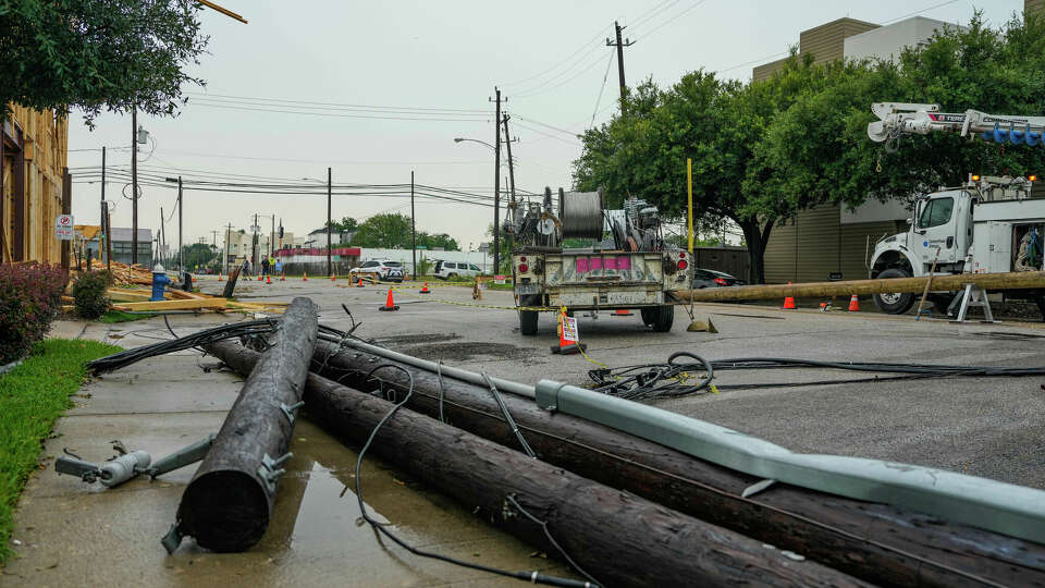 Fallen power lines are seen in the East End neighborhood of Houston, days after Hurricane Beryl made landfall, on Thursday, July 11, 2024 in Houston.